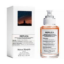 Унисекс парфюм Maison Margiela Replica Under The Stars EDT, бутилка с елегантен дизайн и ароматни нотки на вечерно небе.