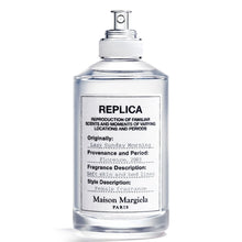 Унисекс парфюм Maison Margiela Replica Lazy Sunday Morning EDT, бутилка с елегантен дизайн и бял капак, изображение.