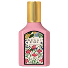 Парфюмна вода за жени Gucci Flora Gorgeous Gardenia EDP, бутилка с цветен дизайн и златни акценти.