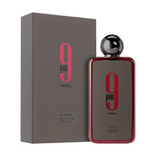 Парфюмна вода Afnan 9 PM Rebel EDP, унисекс, флакон с елегантен дизайн и ароматни нотки, изобразен на изображението