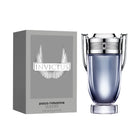 Подарък за мъже: Paco Rabanne Invictus EDT тоалетна вода с прозрачен флакон и златист капак, изображена върху бял фон.