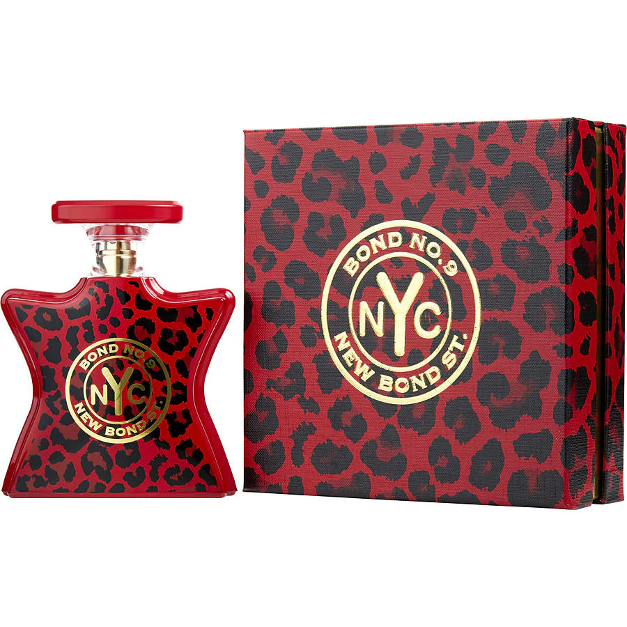 Унисекс парфюмна вода Bond No. 9 New Bond St. EDP, флакон и дизайн на парфюма върху бяла повърхност.
