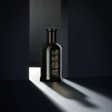 Мъжки парфюм Boss Bottled Parfum на Hugo Boss, елегантна бутилка с флакон за мъжки аромат.