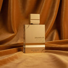 Ал Харамайн Amber Oud Gold Edition EDP унисекс парфюмна вода, изящна бутилка със златен дизайн и ароматна нотка.