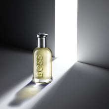Hugo Boss Boss Bottled EDT парфюм за жени, бутилка с изискан дизайн и аромат, видима на снимката.