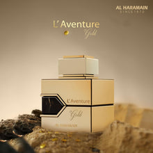 Ал Харaмайн L`Aventure Gold EDP парфюмна вода за жени с златист флакон и цветен дизайн, ароматна и елегантна.