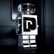 Тоалетна вода за мъже Paco Rabanne Phantom EDT, флакон с елегантен дизайн и ароматни нотки, показан на изображението.