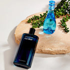 Тоалетна вода за мъже Davidoff Cool Water EDT в спрей, показана в различни разфасовки, с морски и свежи нотки.