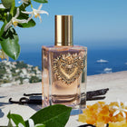 Долче и Габана Devotion EDP парфюмна вода за жени, бутилка с елегантен дизайн и ароматни нотки, изображение на опаковката