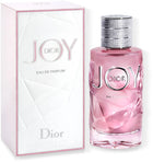 Дамски парфюм Dior Joy EDP с цветни и плодови нотки, бутилка с изчистен дизайн и логото на Dior.