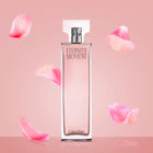 Парфюмна вода за жени Calvin Klein Eternity Moment EDP, елегантна бутилка с цветен дизайн и флакон.