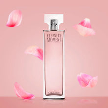 Парфюмна вода за жени Calvin Klein Eternity Moment EDP, елегантна бутилка с цветен дизайн и флакон.