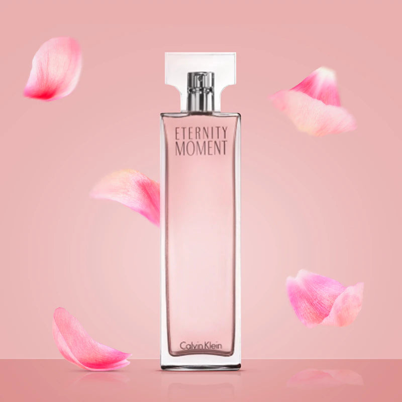Парфюмна вода за жени Calvin Klein Eternity Moment EDP, елегантна бутилка с цветен дизайн и флакон.
