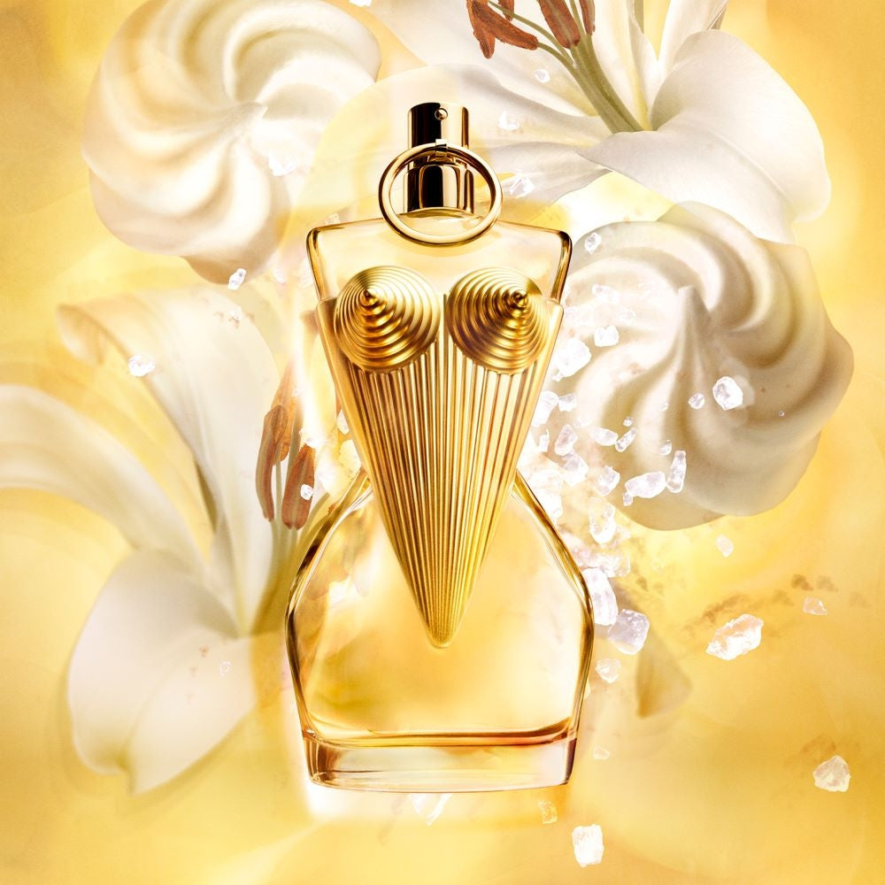 Парфюмна вода Jean Paul Gaultier Divine EDP за жени, флакон с елегантен дизайн и цветна капачка, върху бял фон