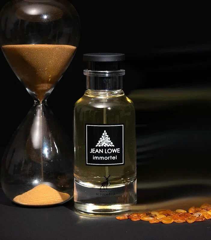 Maison Alhambra Jean Lowe Immortel EDP мъжки парфюмна вода с ароматни нотки, показана в елегантна бутилка.