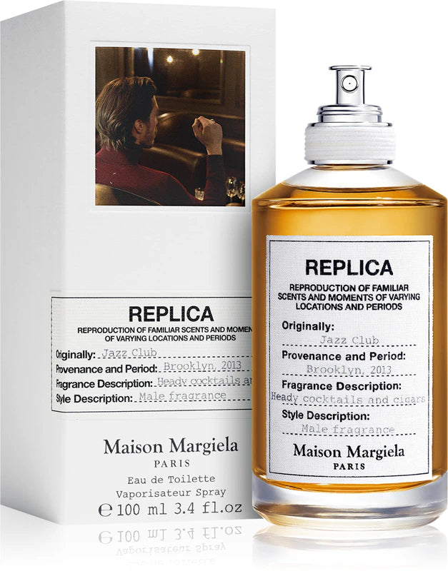 Мъжко и женско парфюмно Eau de Toilette Maison Margiela Replica Jazz Club с бутилка и ароматна опаковка.