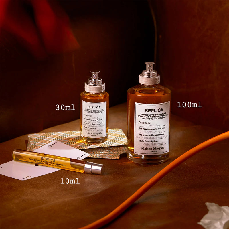 Унисекс парфюм Maison Margiela Replica Jazz Club EDT с флакон и елегантен дизайн, подходящ за мъже и жени.