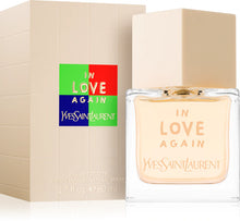 Тоалетна вода за жени Yves Saint Laurent In Love Again EDT, флакон с елегантен дизайн и розов цвят.