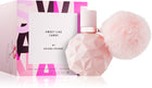 Парфюмна вода Ariana Grande Sweet Like Candy EDP за жени, бутилка с розов и бял дизайн, изразяваща сладък и женствен аромат