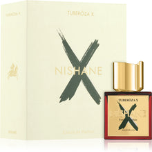 Унисекс парфюм Nishane Tuberóza X с изображение на флакон с бял и златист дизайн, подчертаващ цветя и елегантност